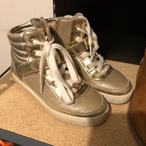 Kids lace up Gold Michael Kors tennis shoes